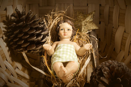 Christmas background, Baby Jesus in the crib on rustic background